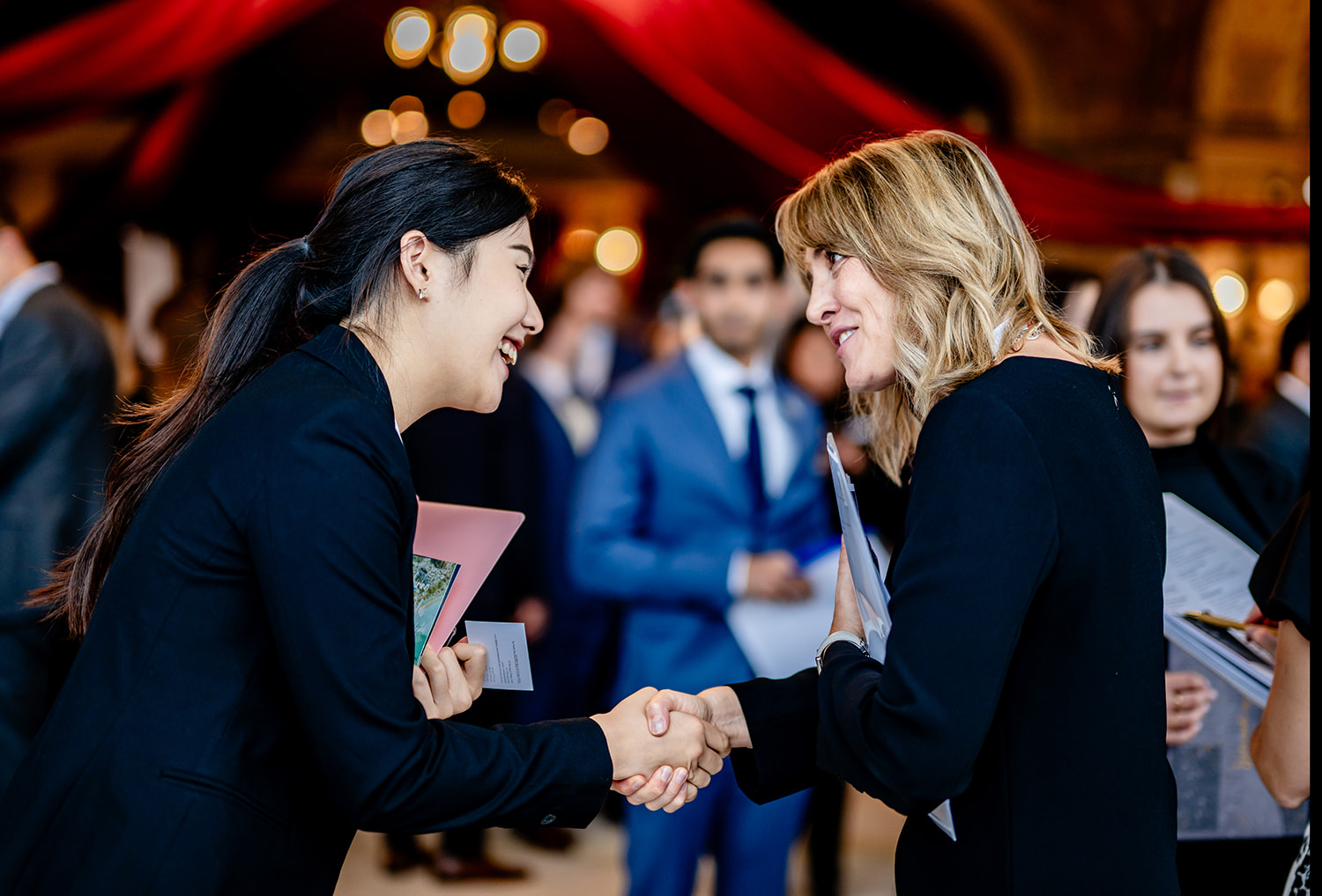 Student networking at a job fair